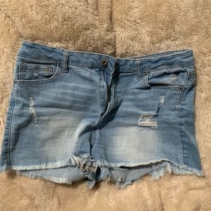 Light denim wax jean shorts